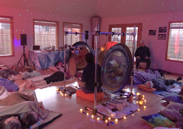 Mark doing a Sonic Journey wellness retreat sound bath in Yachats